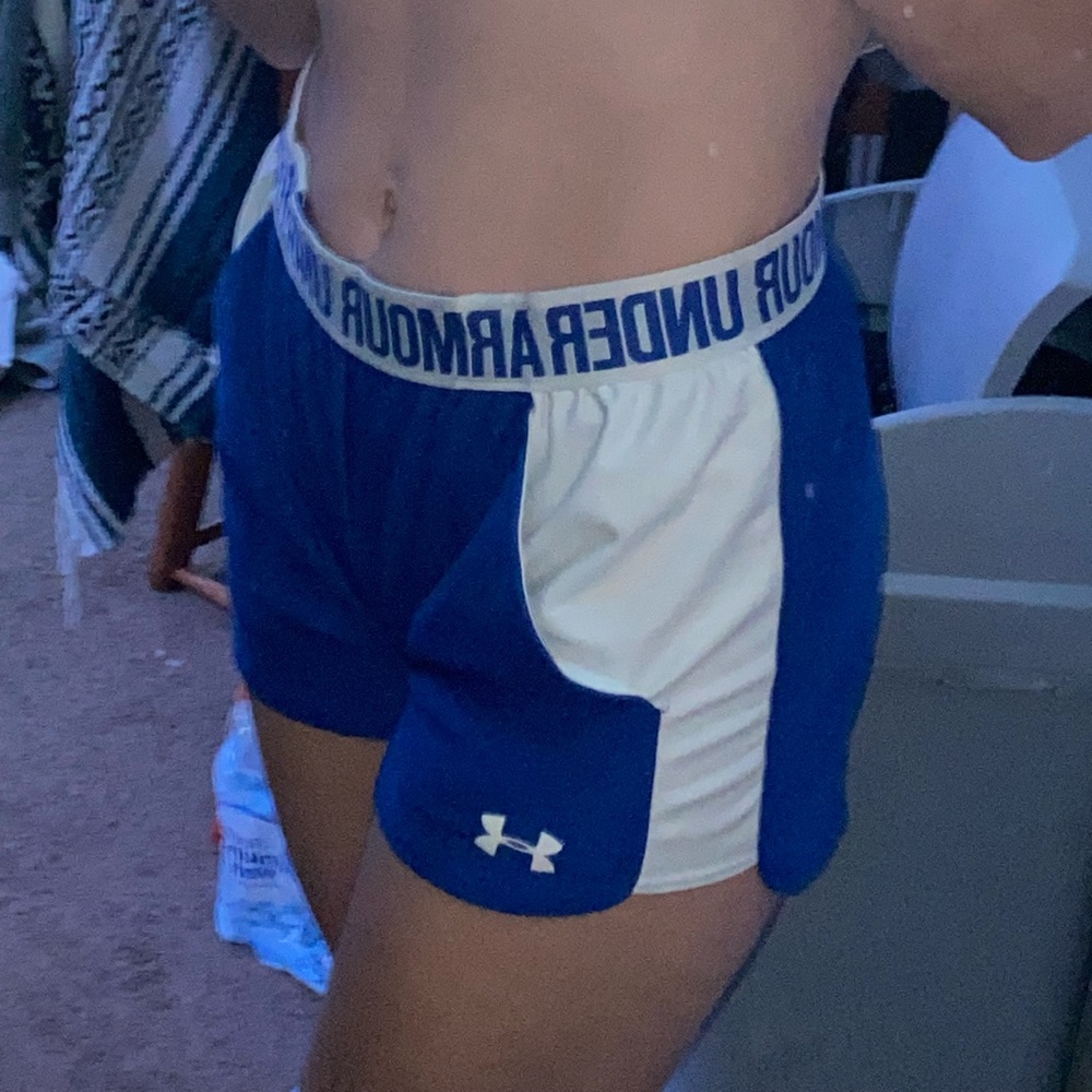 Blue Under Armour shorts.